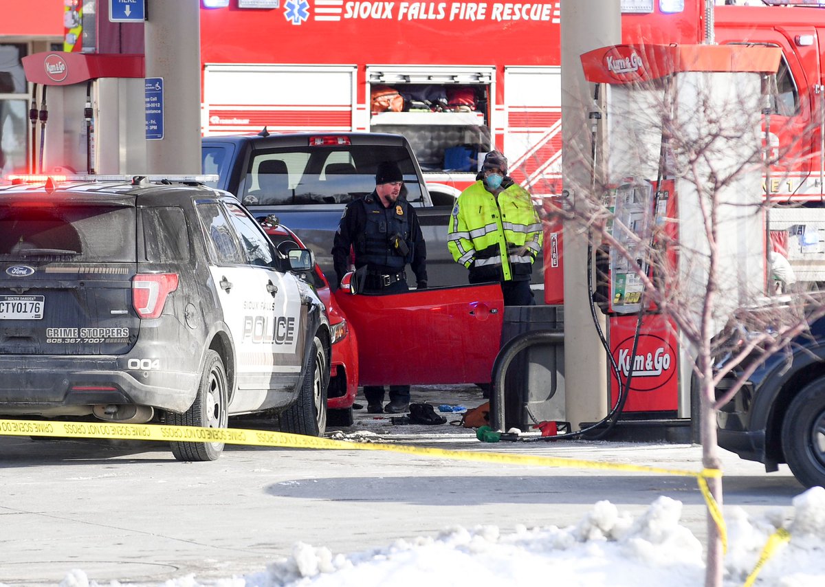 At the scene of a shooting at the Kum and Go on the corner of Minnesota and Russell. Several minutes ago, two ambulances left with lights flashing and sirens on 