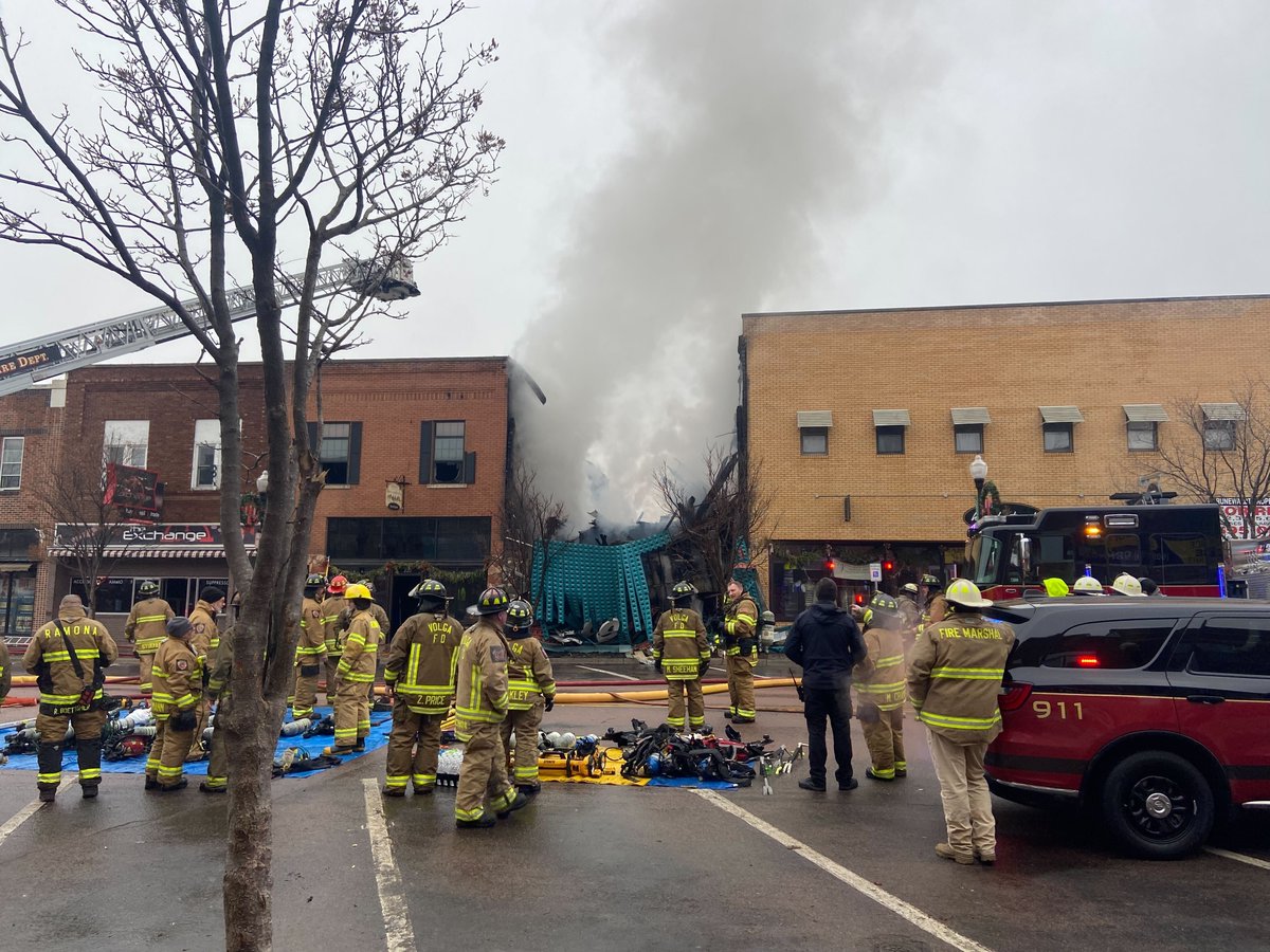 Crews continue to battle a fire in downtown Brookings Monday morning. 